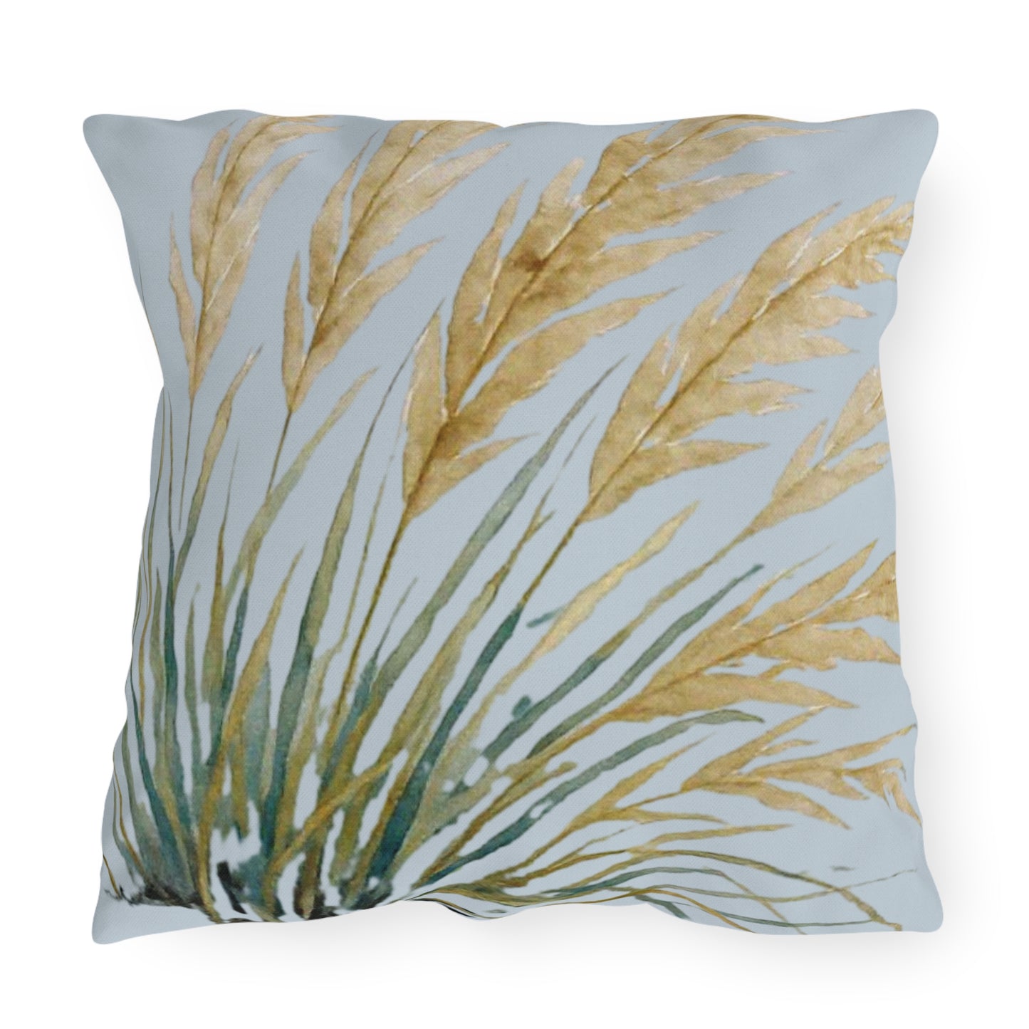 Decorative pillow with leaf pattern on a light blue background