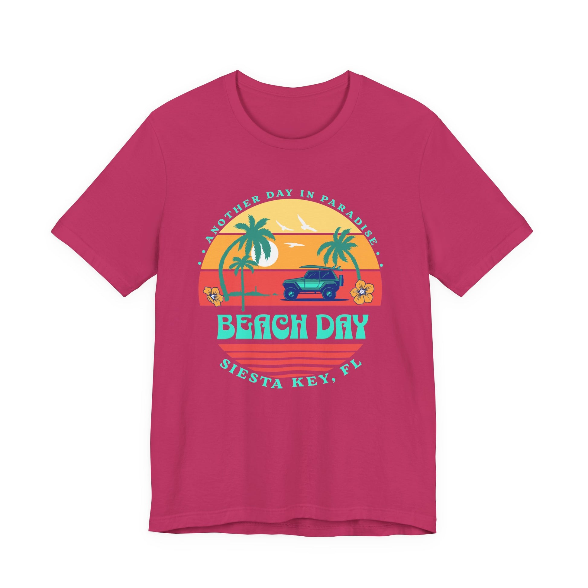 Pink t-shirt with 'Beach Day' graphic design on a white background- Caribbean Rays