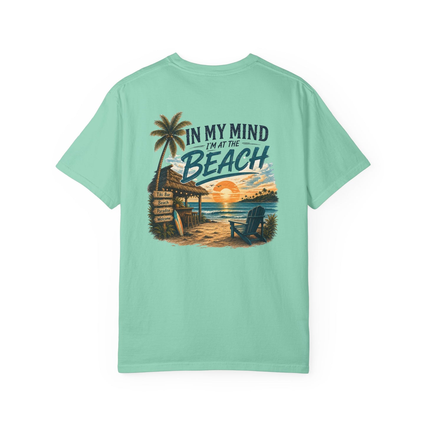 Mint green t-shirt with beach graphic and text on a white background
