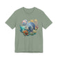 Sage green t-shirt with a colorful fish and coral design on a white background by Caribbean Rays