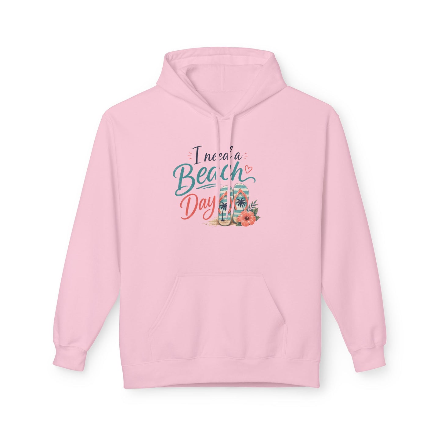 A light pink pullover hoodie with a graphic on the chest that reads 'I need a Beach Day' in teal and coral script, accompanied by illustrations of a beach umbrella, palm tree, and flowers. The hoodie is displayed against a clean white background.