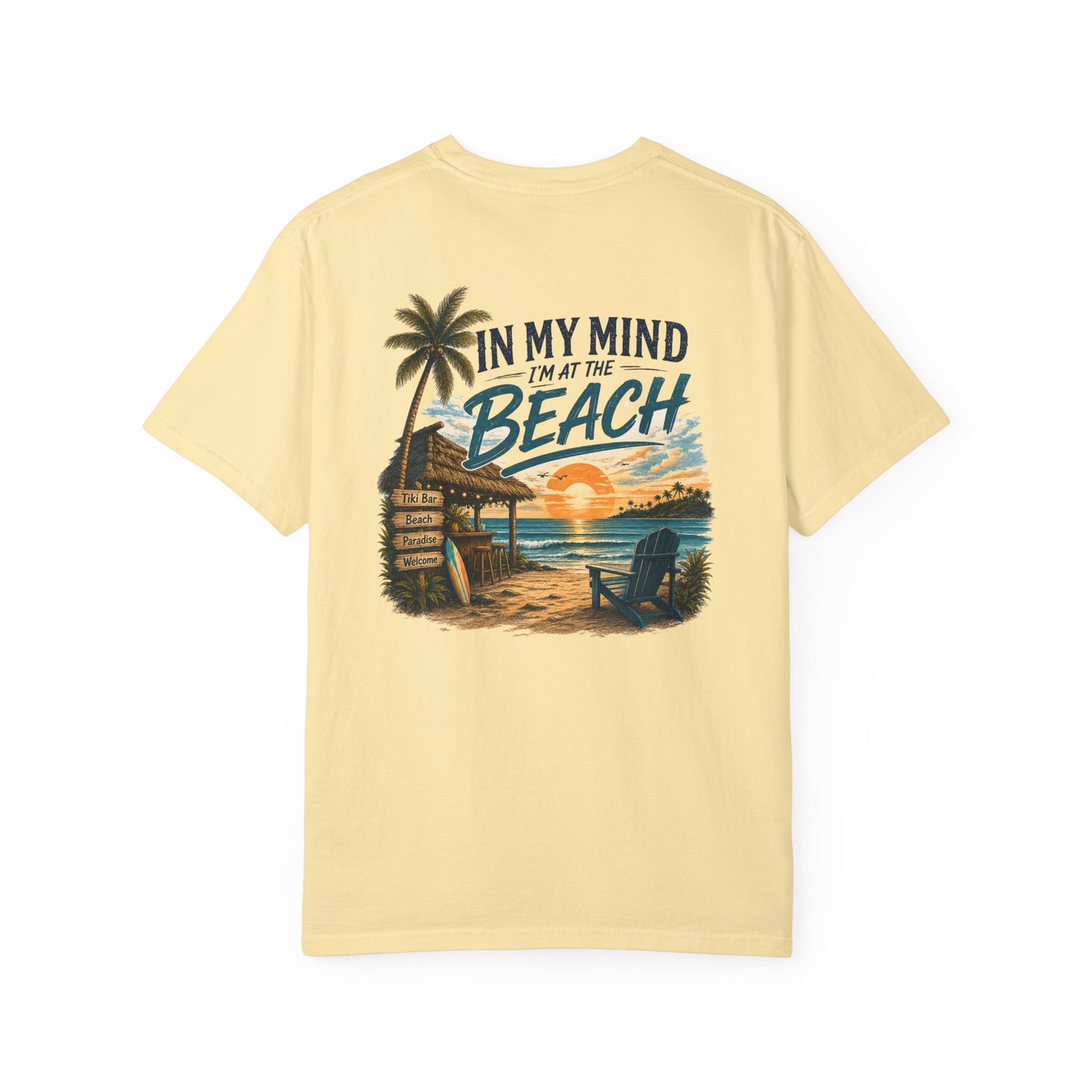 Beige t-shirt with beach graphic and text on a white background