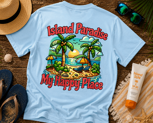 Light blue t-shirt with 'Island Paradise, My Happy Place' design on a wooden surface with beach accessories.