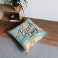 Square tufted floor pillow, light blue 'Beach Day' with seashell and starfish print.