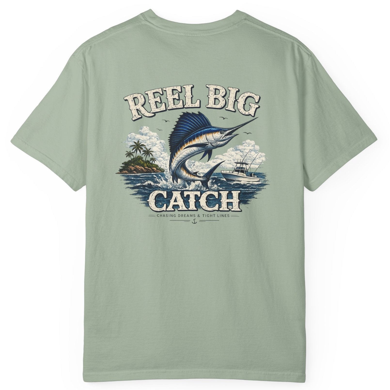 Light green t-shirt with 'Reel Big Catch' graphic on a white background