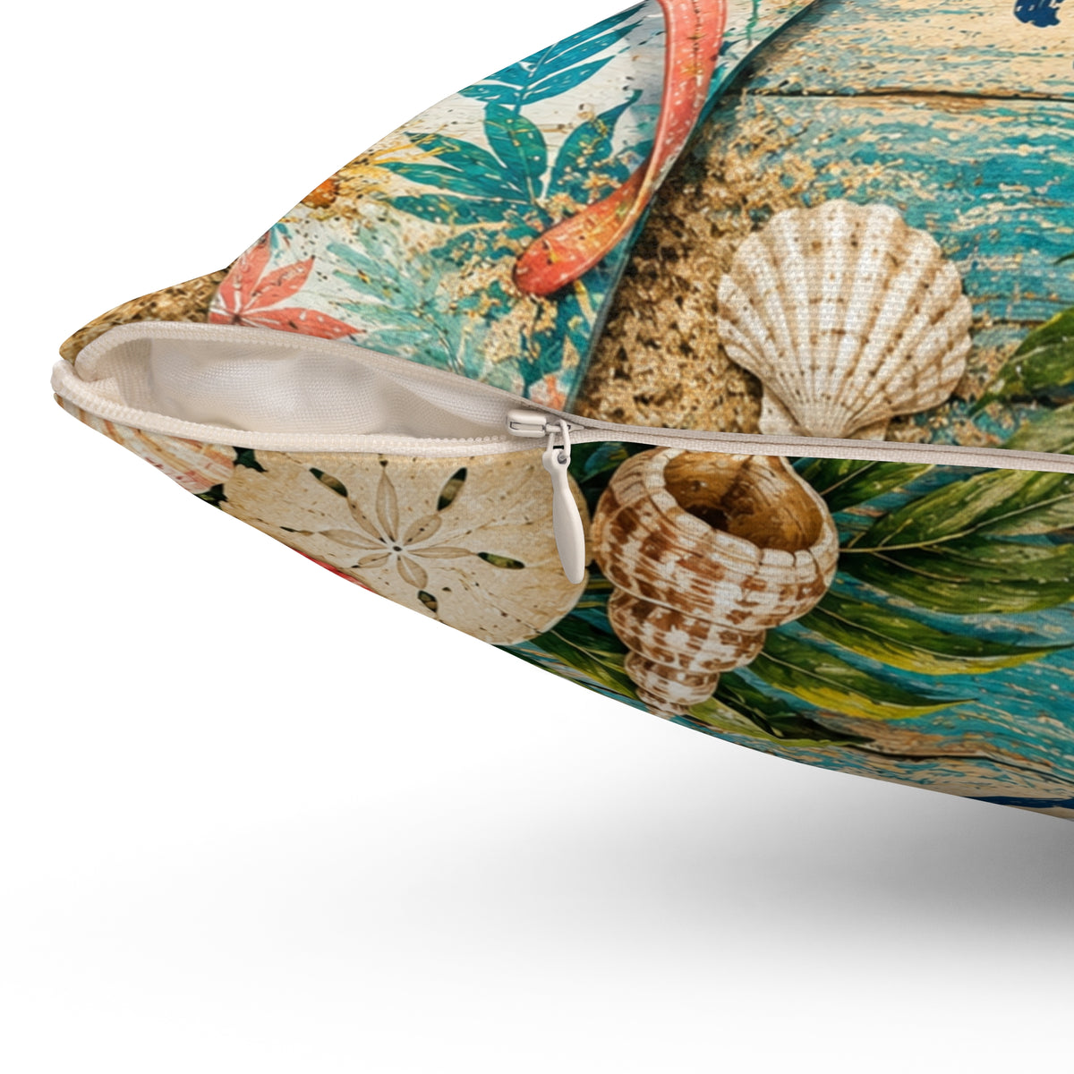 Square pillow with zipper opening and seashells; teal water, beige sand, and leaf pattern