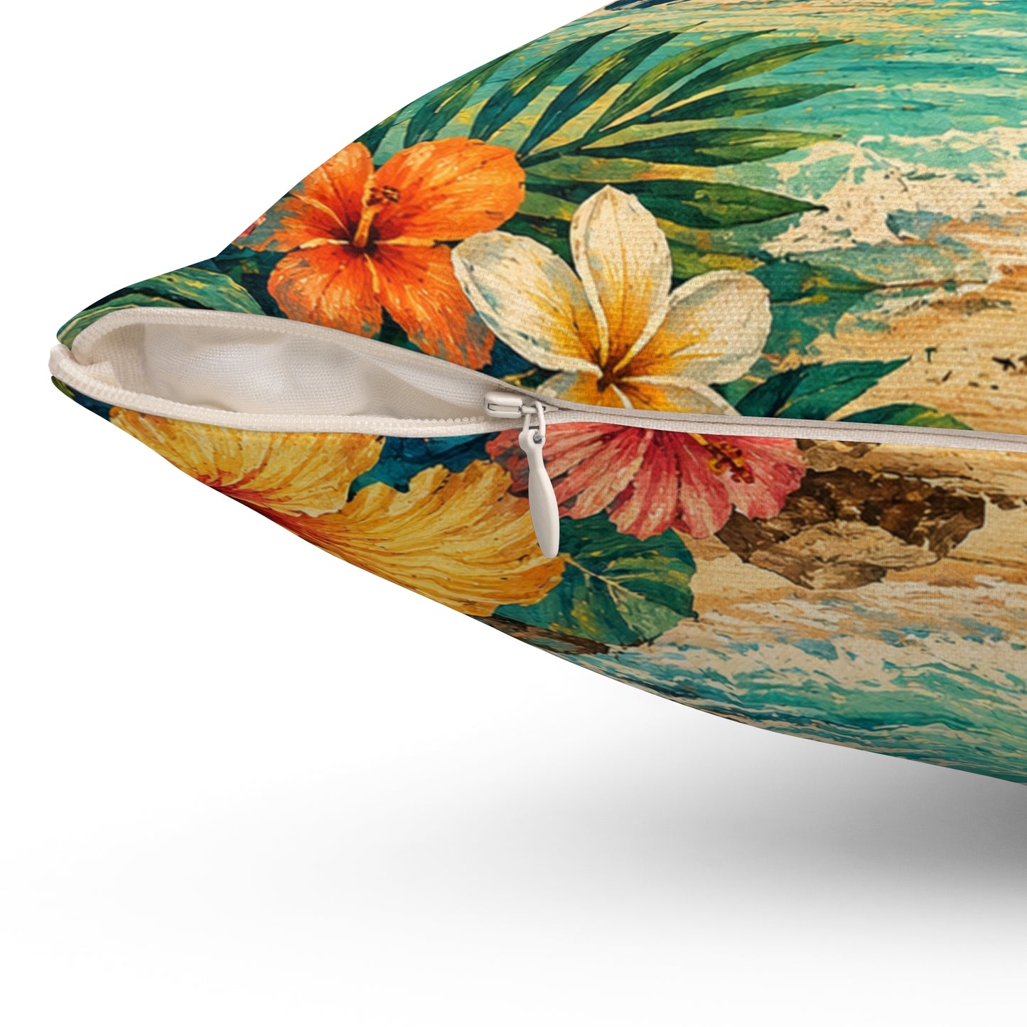 Square polyester pillow cover angled with tropical hibiscus blossoms and visible zipper seam