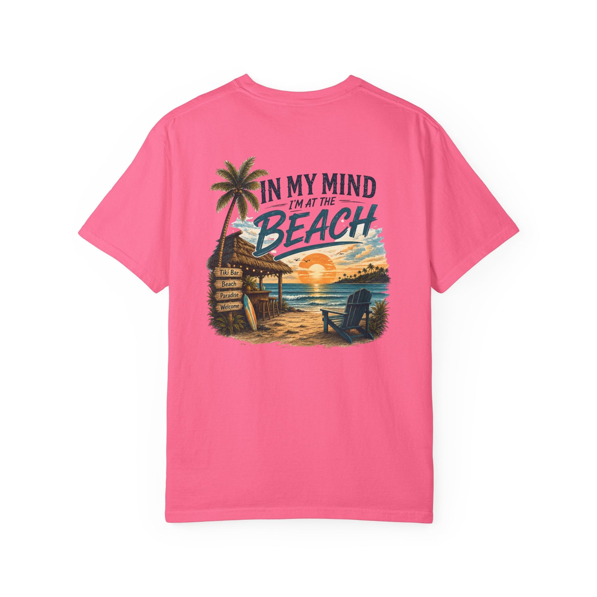 Pink t-shirt with beach graphic and text on a white background