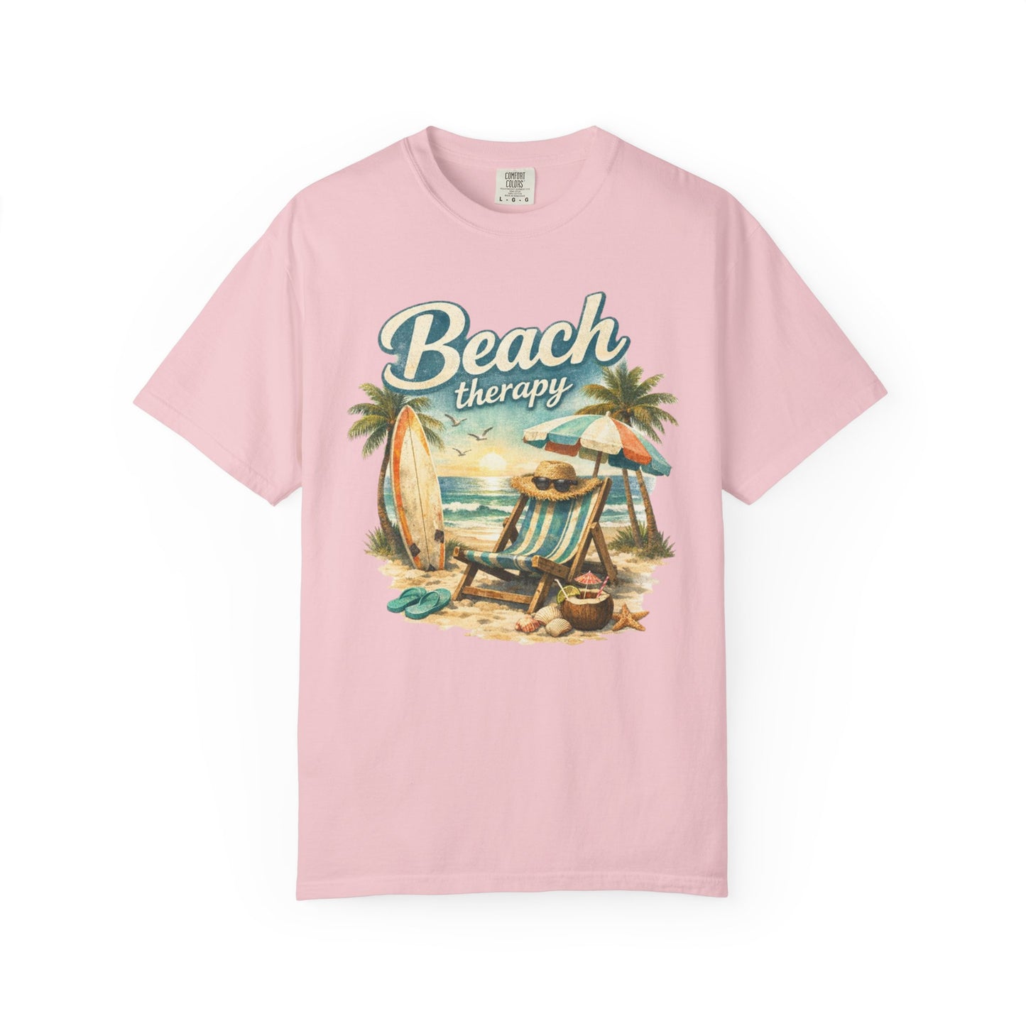 Pink t-shirt with 'Beach Therapy' graphic design featuring a beach scene.
