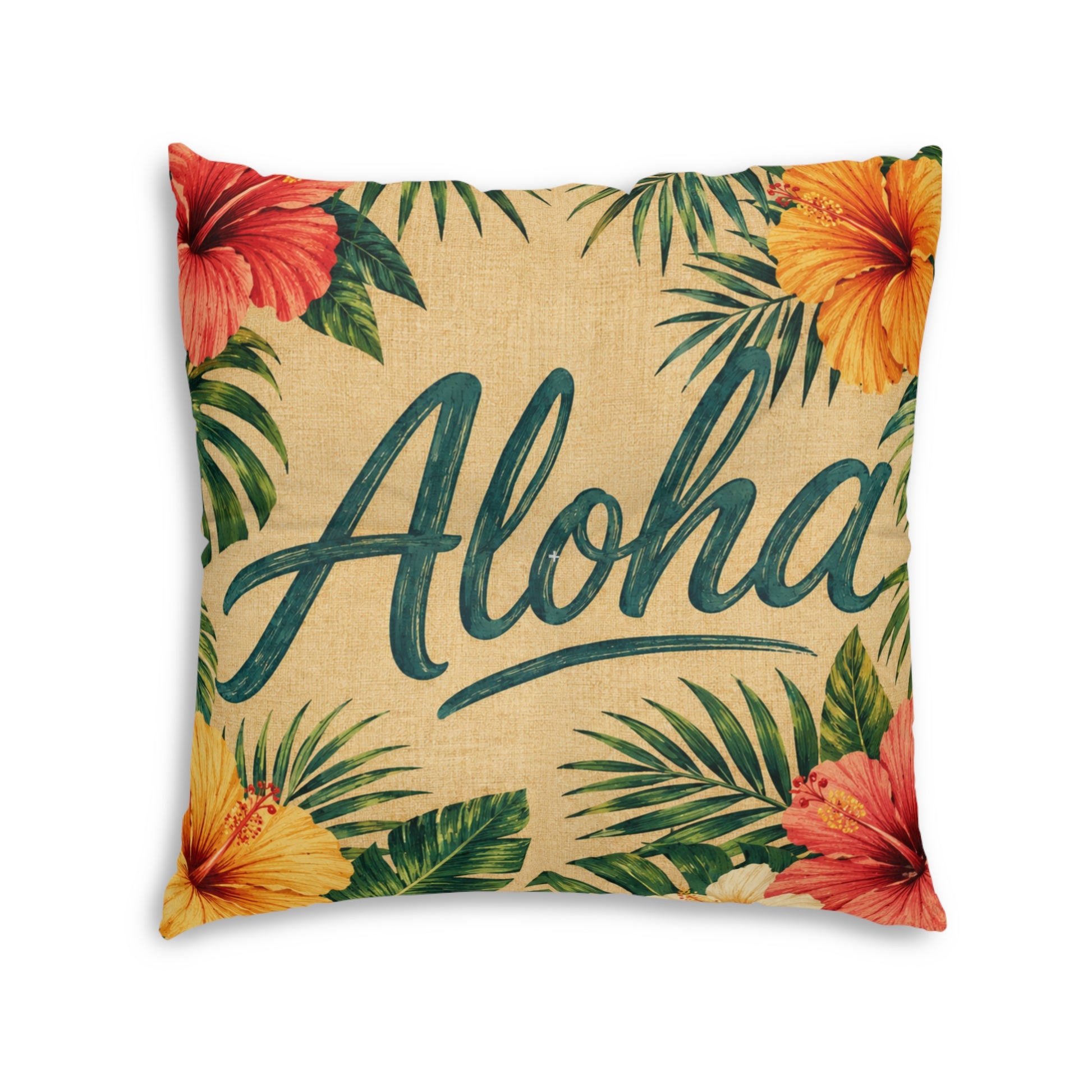 Square tufted floor pillow with tropical Aloha script, hibiscus flowers, and palm leaves on tan