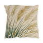 Decorative pillow with leaf pattern on a beige background