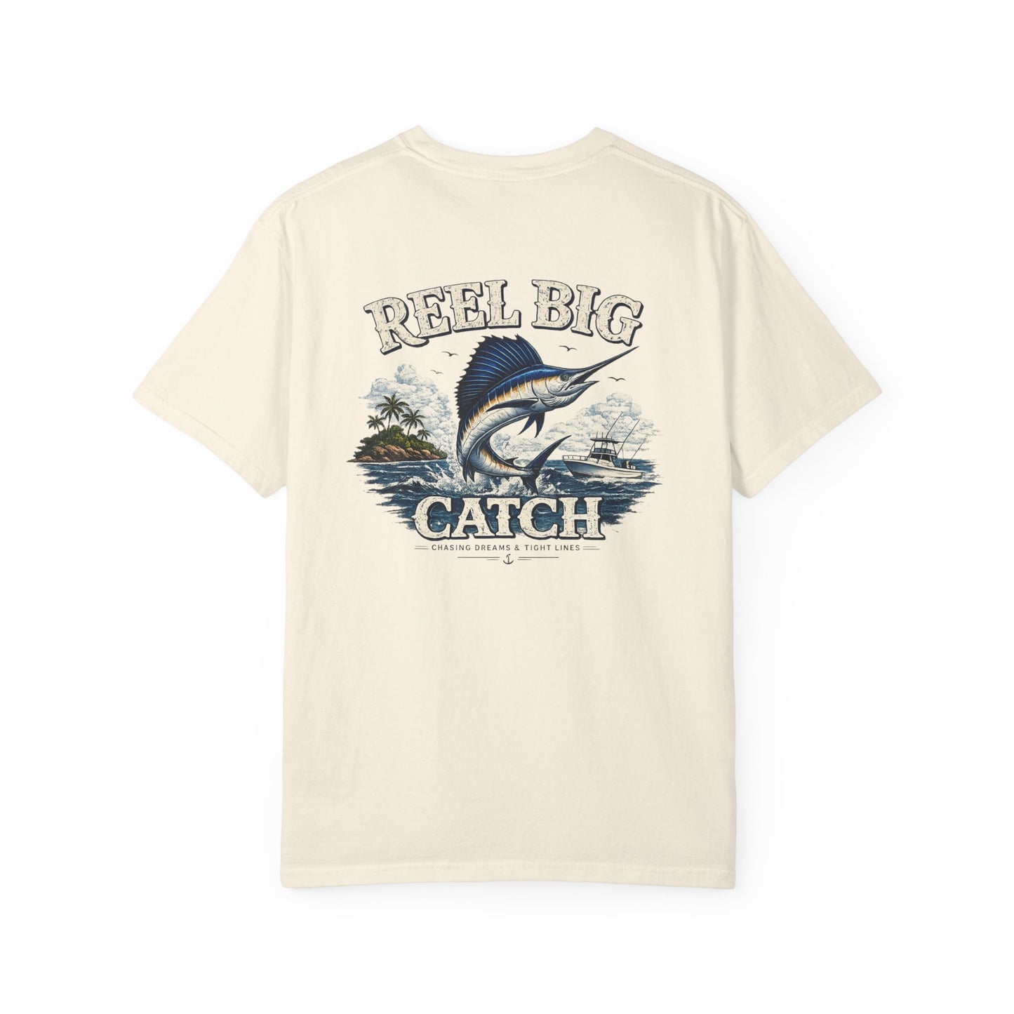 Beige t-shirt with fishing graphic and 'Reel Big Catch' text on a white background
