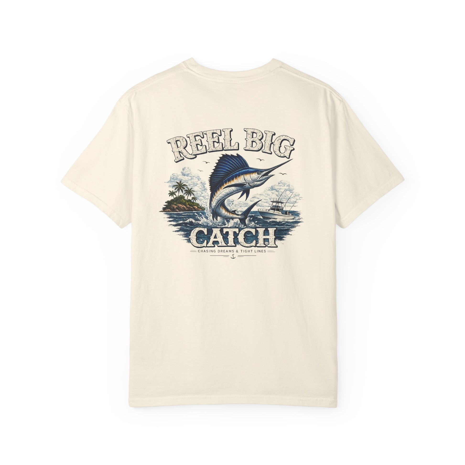 Beige t-shirt with fishing graphic and 'Reel Big Catch' text on a white background