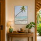 Decorative console table with a tropical beach scene painting in a room with wooden doors and plants.