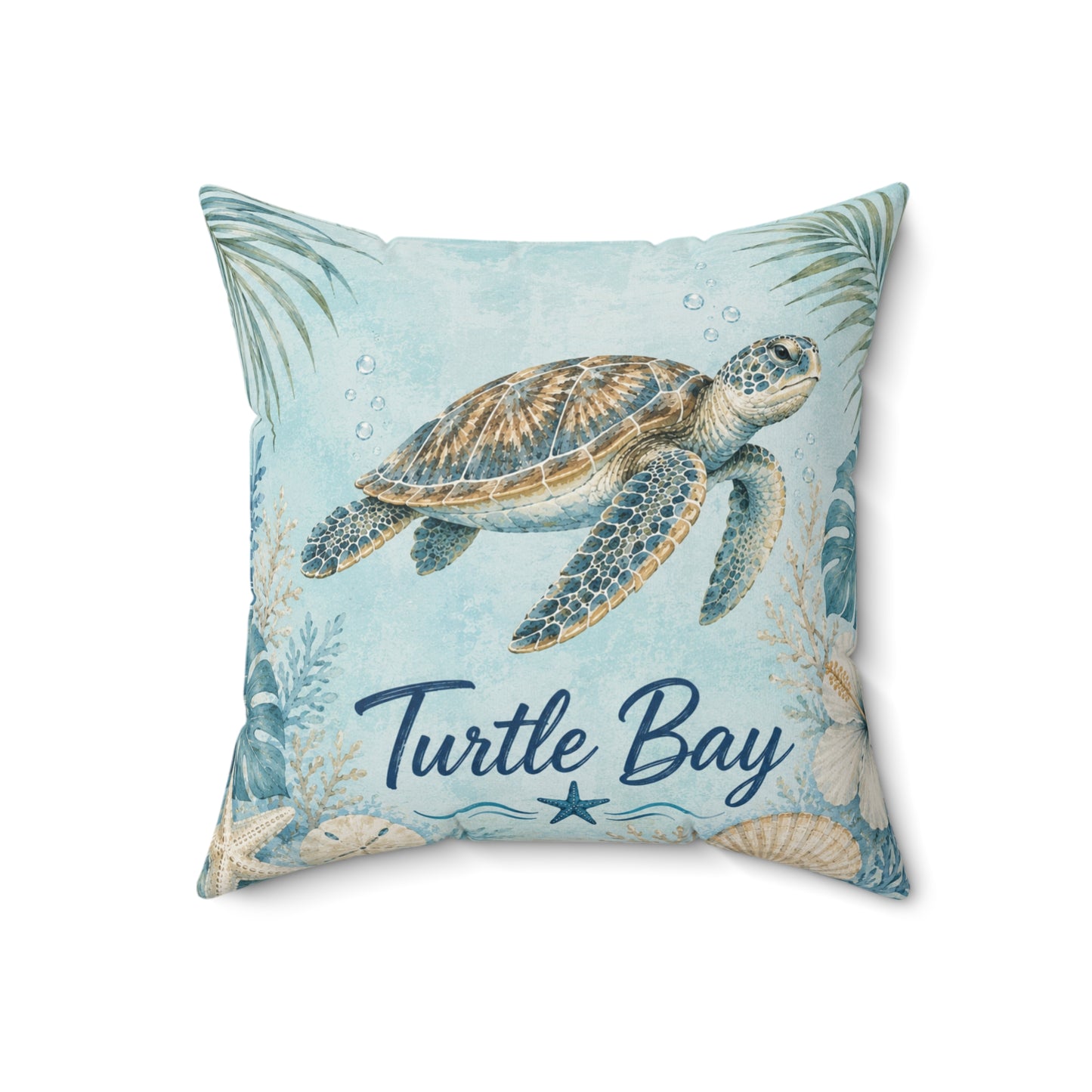 A square decorative throw pillow featuring a sea turtle illustration on a light blue watercolor-style background, with the words 'Turtle Bay' and a star near the bottom. Palm leaves and seashell motifs frame the design.