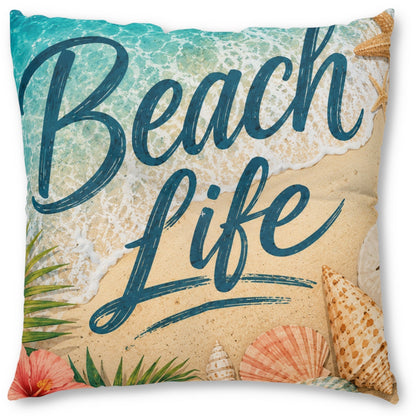 A square decorative throw pillow featuring a beach-themed print with the words 'Beach Life' in dark teal script over turquoise ocean water, white foam, sandy beige tones, and seashells and palm leaves.