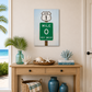 Decorative table with a 'Mile 0 Key West' sign above it, featuring a beach-themed interior.