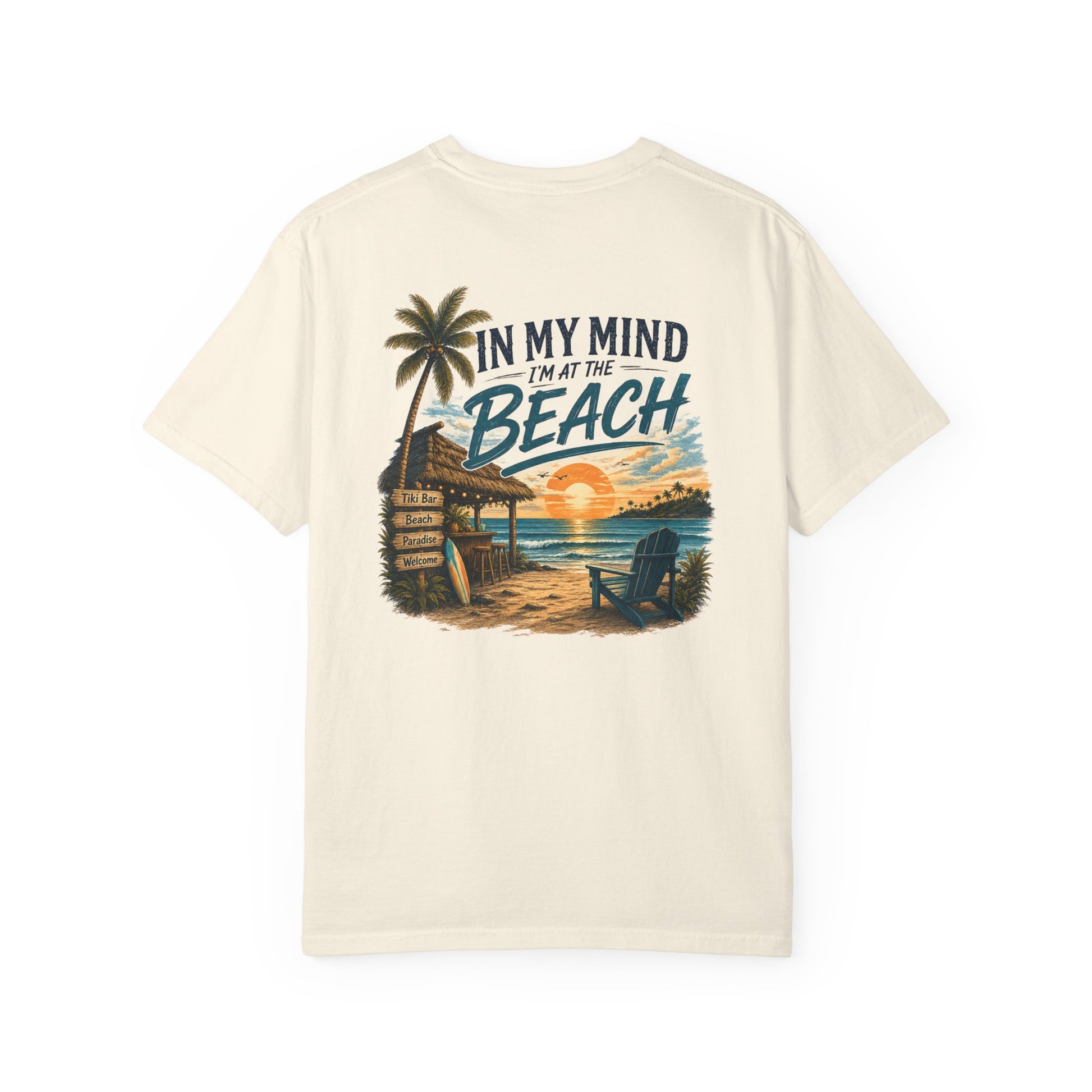 Beige t-shirt with beach graphic and text on a white background