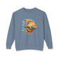 Unisex lightweight crewneck sweatshirt in blue denim with colorful fish graphic on front