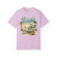 Pink t-shirt with 'Beach Therapy' graphic design featuring a beach scene.