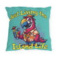 Pillow with a parrot design and 'Just Living the Island Life' text on a blue background