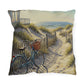 Decorative pillow with a beach scene featuring a bicycle and ocean view.