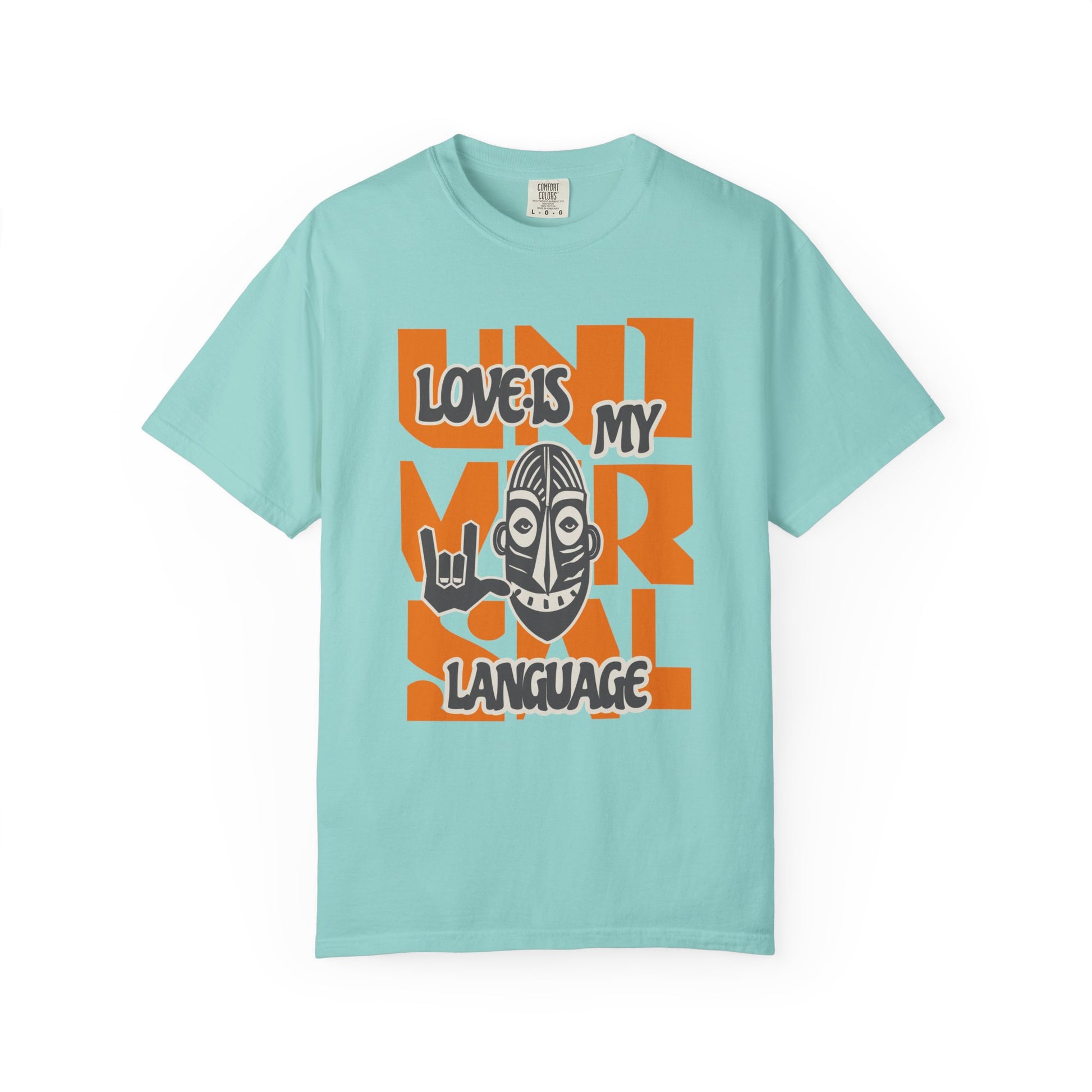 Light blue t-shirt with colorful graphic design on a white background at Caribbean Rays