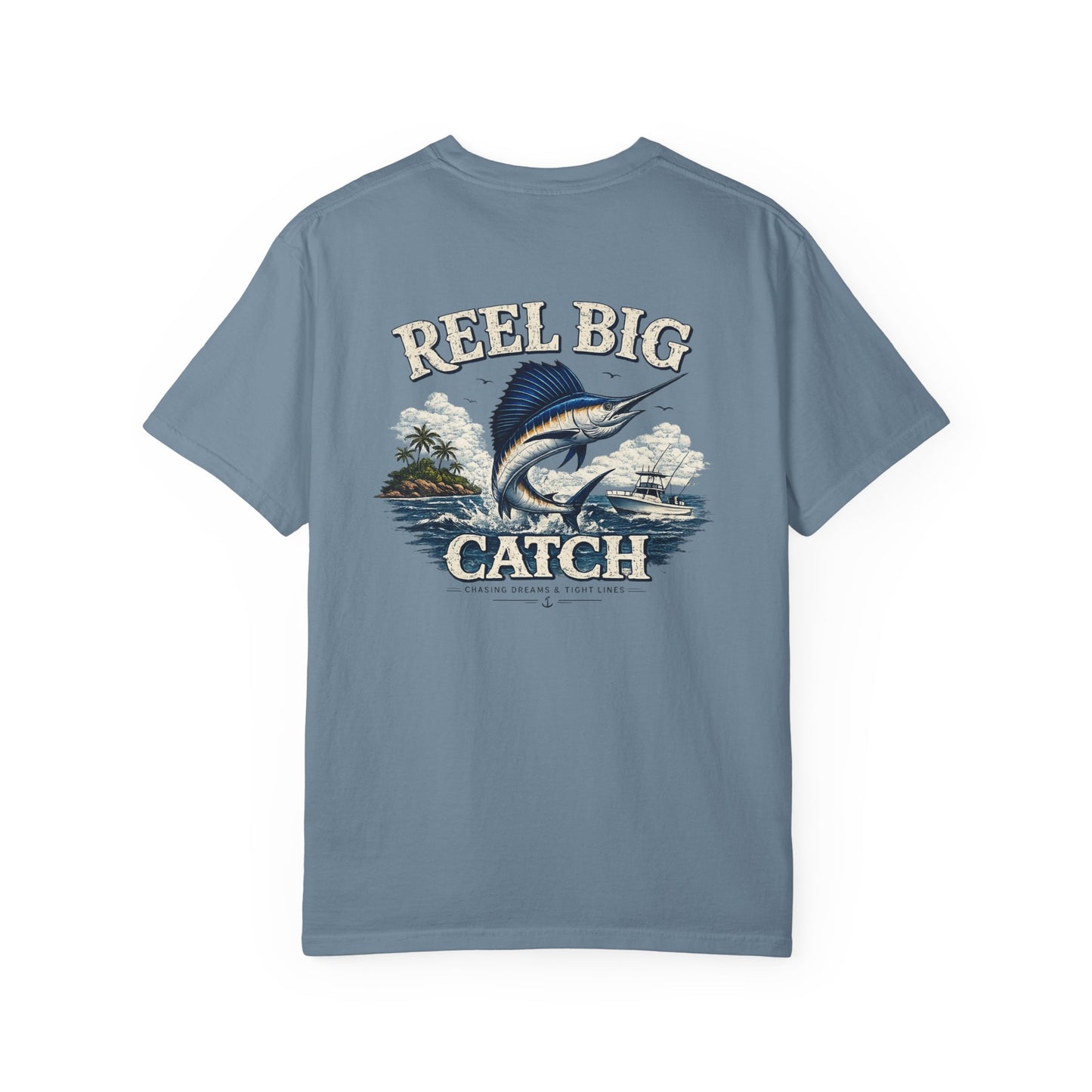 Blue t-shirt with 'Reel Big Catch' graphic design on a white background