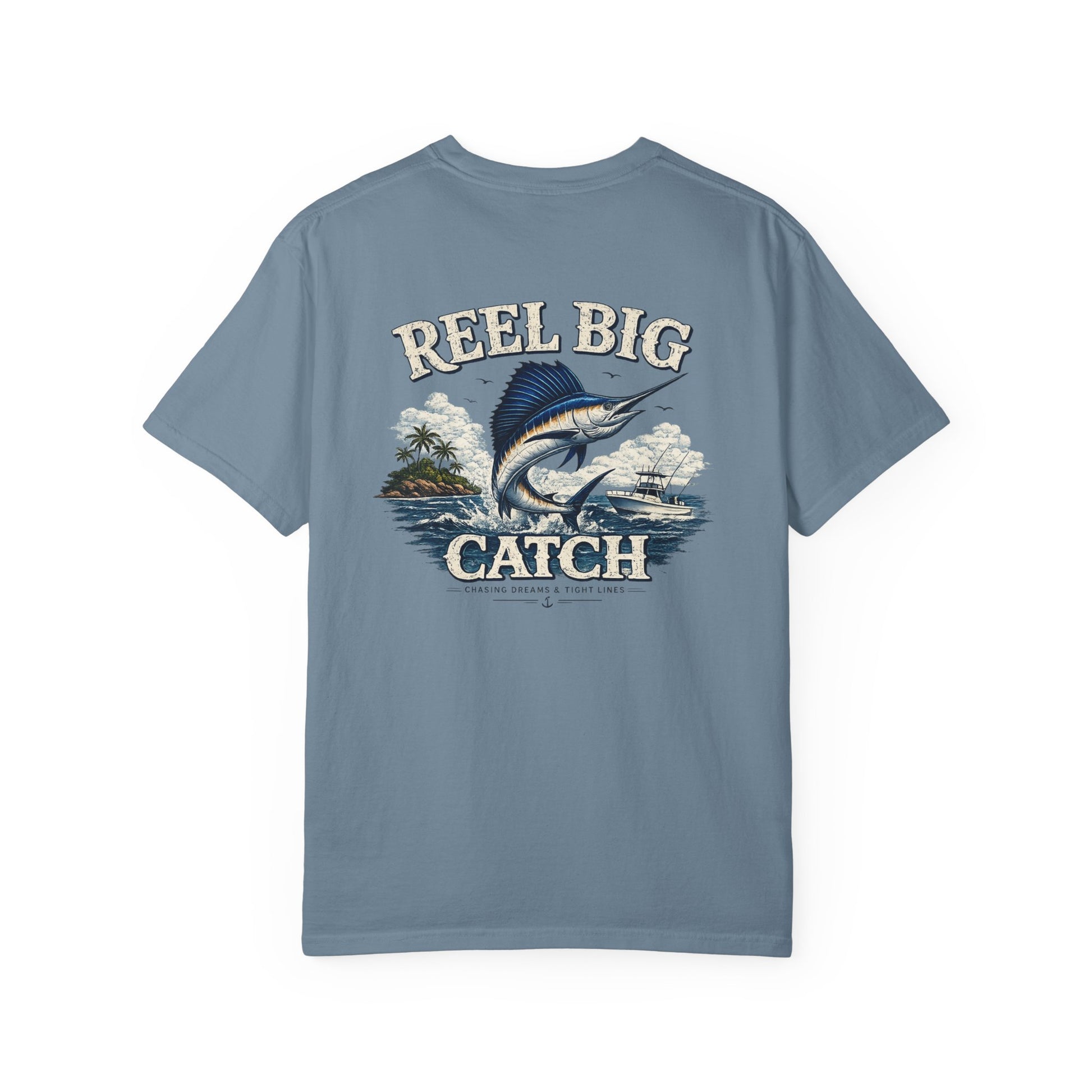 Blue t-shirt with 'Reel Big Catch' graphic design on a white background