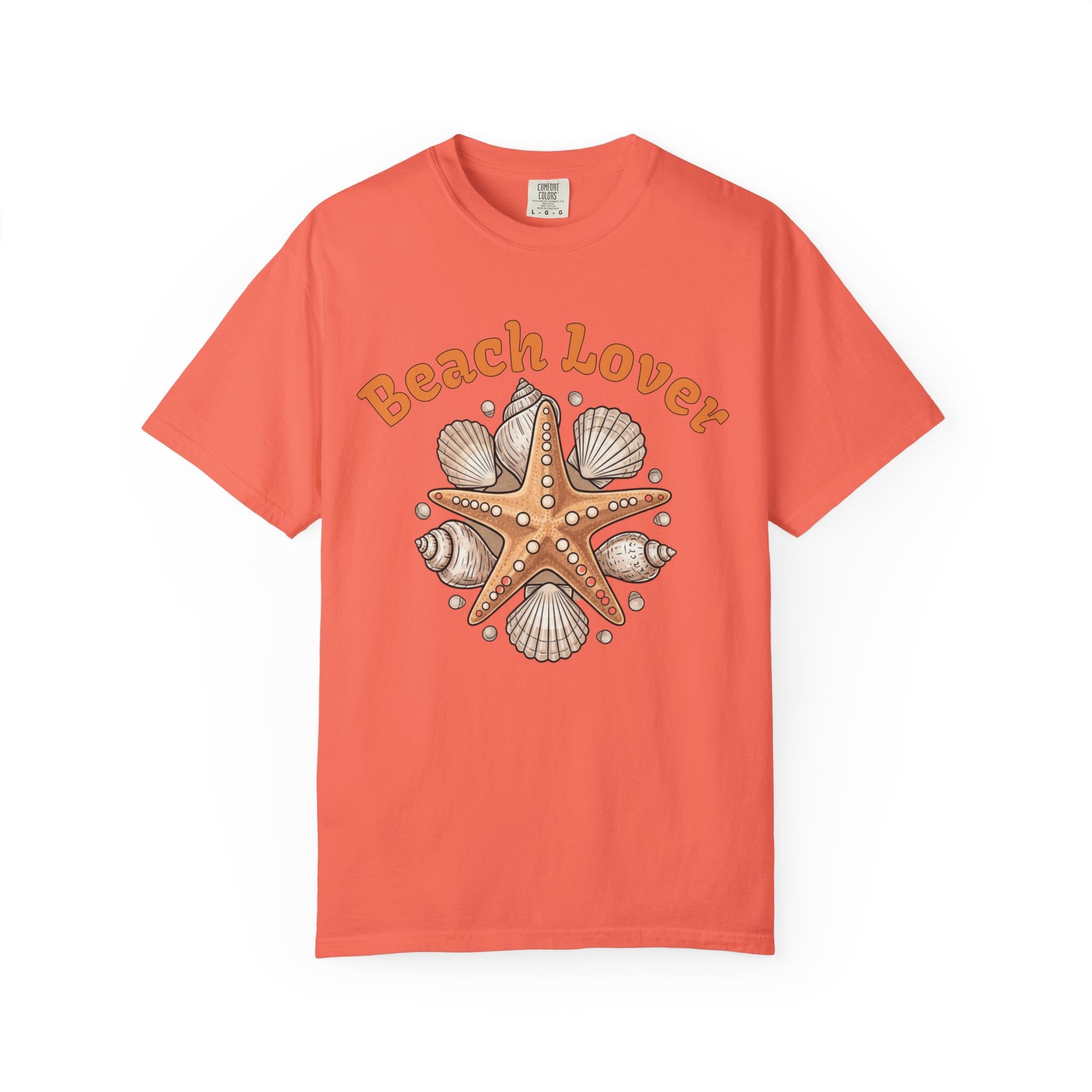 Coral t-shirt with starfish and shell design and 'Beach Lover' text on a white background