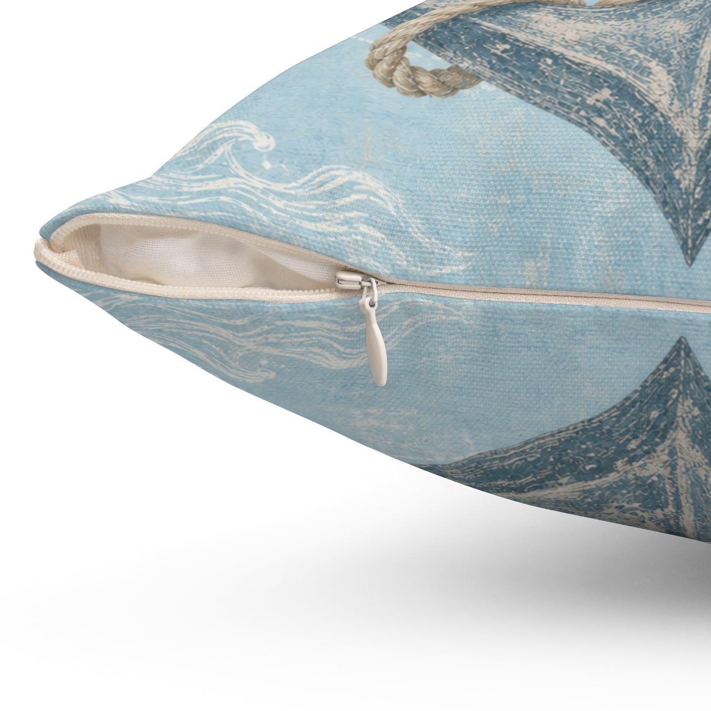 Light blue square pillow shown side view with zipper and beige interior