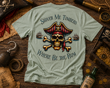 T-shirt with pirate-themed design on a wooden surface with pirate-themed items.