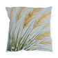 Decorative pillow with leaf pattern on a light blue background
