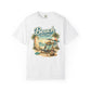 White t-shirt with 'Beach Therapy' graphic design featuring a beach scene.