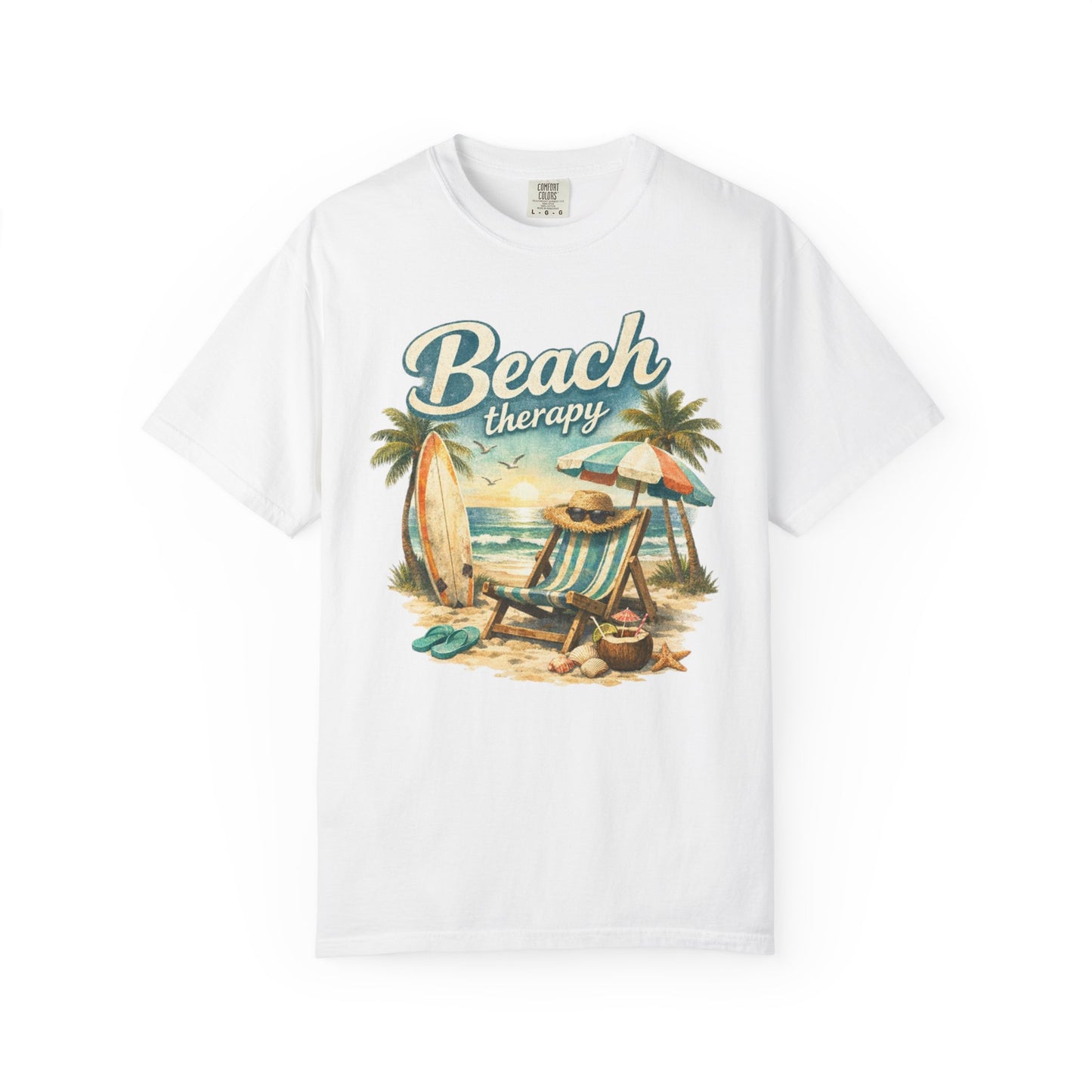White t-shirt with 'Beach Therapy' graphic design featuring a beach scene.