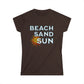 Brown t-shirt with 'Beach Sand Sun' text and sun graphic on a white background