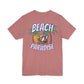 Pink t-shirt with 'Beach Paradise' graphic on the back by Caribbean Rays