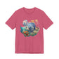 Pink t-shirt with an underwater scene design featuring a fish and coral on a white background at Caribbean Rays