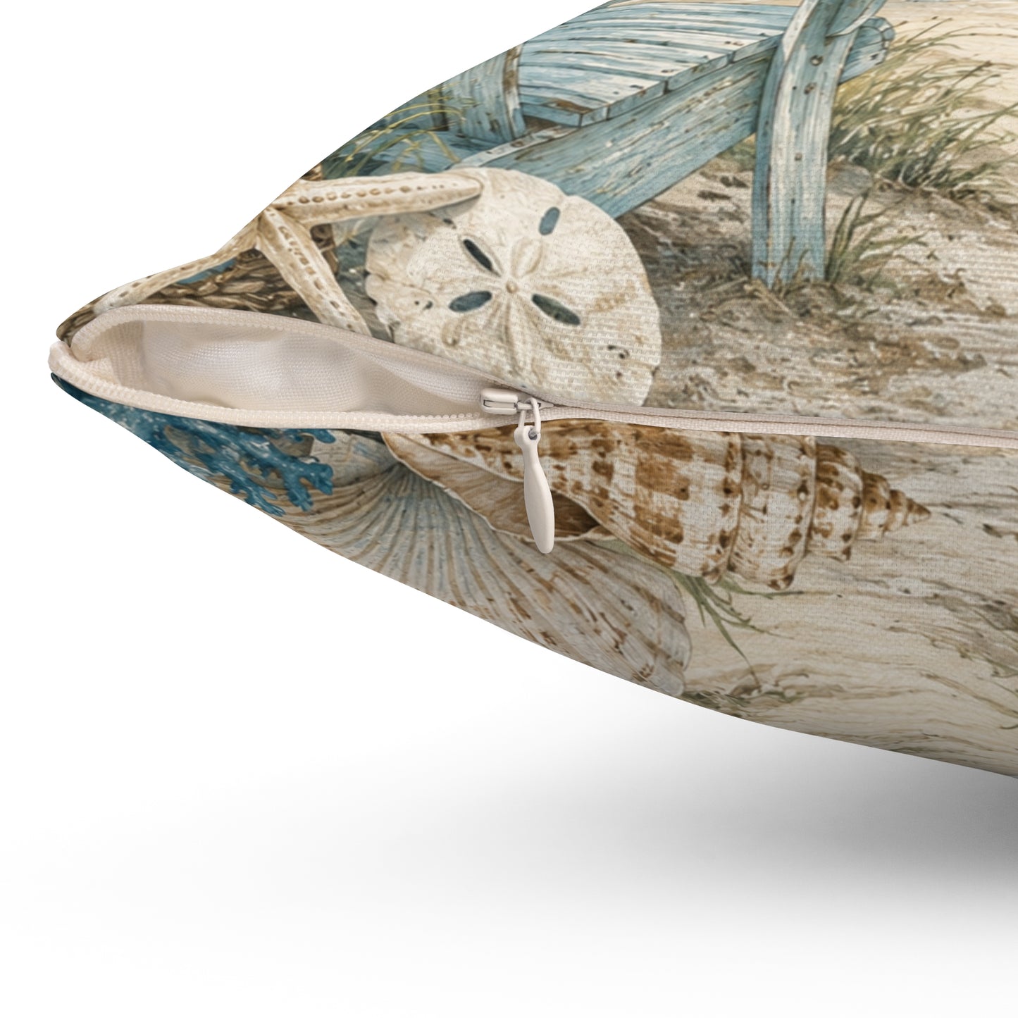 Square polyester pillow close side view with zipper trim and beach mural pattern.