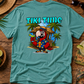 Teal t-shirt with a parrot graphic and 'Tiki Time' text on a wooden surface with tropical items.