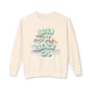 Beige sweatshirt with 'Born to be a Beach Girl' text and wave design on a white background at Caribbean Rays