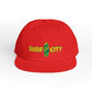 Red cap with 'Surf City' logo on a white background