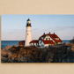 Lighthouse and building on a rocky cliff with ocean view