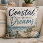 Square polyester throw pillow with Coastal Dreams lettering and ocean beach artwork.