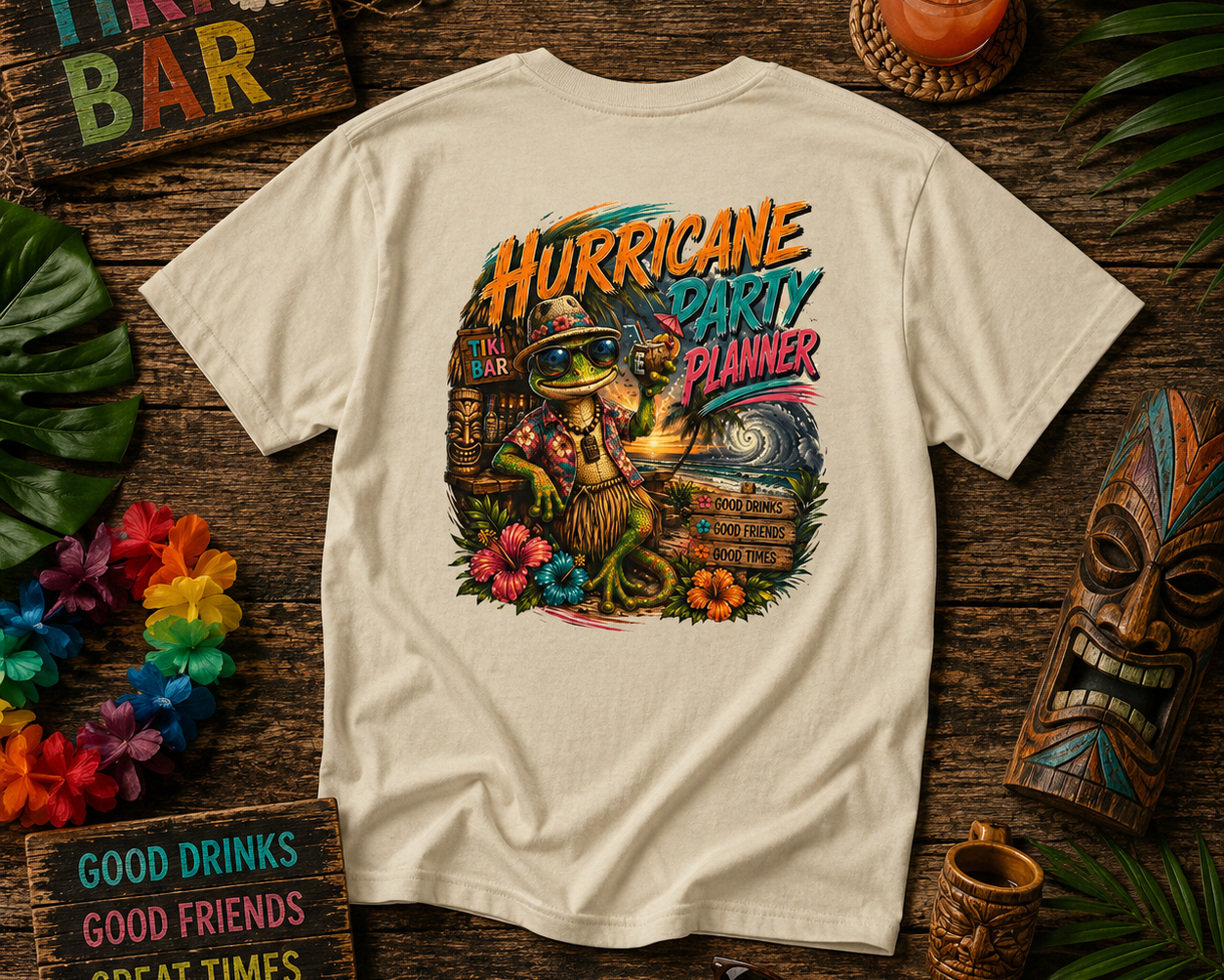 T-shirt with a tropical design and text on a wooden table with tiki-themed decor.