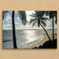 Beach scene with palm trees and ocean on a beige background