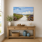 Nautical-themed wall art above a wooden console table with decorative items.