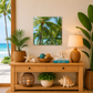 Decorative shelf with plants, books, and a lamp in a room with a beach view.