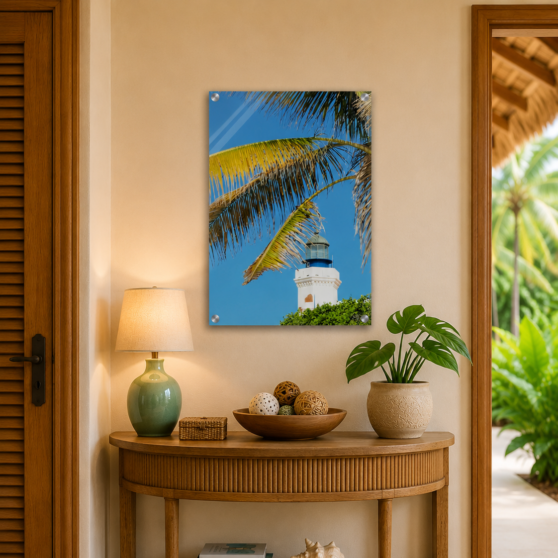 Decorative interior with a table, lamp, and wall art of a lighthouse and palm trees.