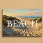 Painting of a beach scene with the word 'BEACH' overlaid on a beige background